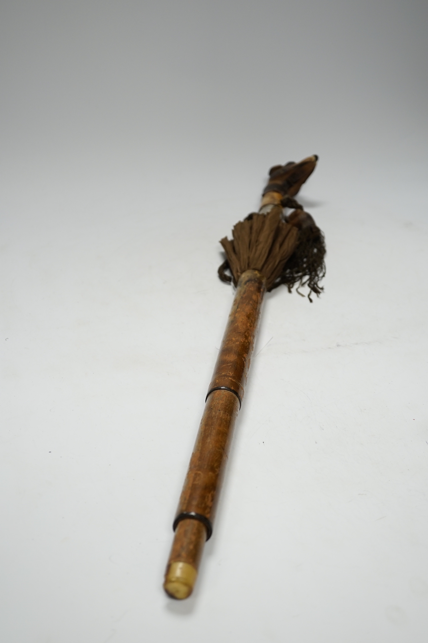 A Victorian silk parasol, carved ‘dogs head’ handle with articulated jaw and telescopic bamboo cover